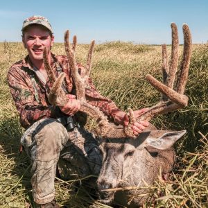 Canadian Mule Deer Hunt - hunter with mule deer