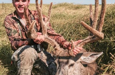 Canadian Mule Deer Hunt - hunter with mule deer
